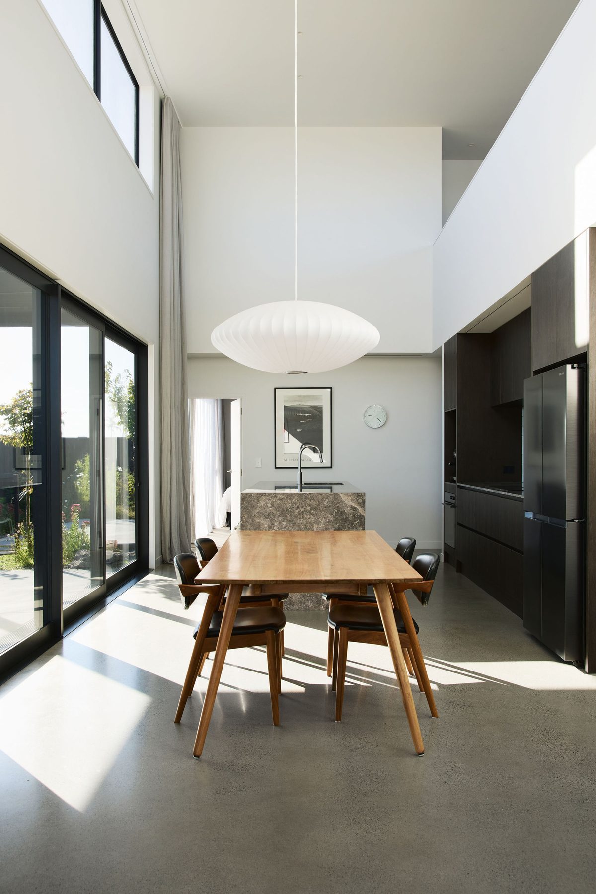 Dining beneath the pendant, light from above.
