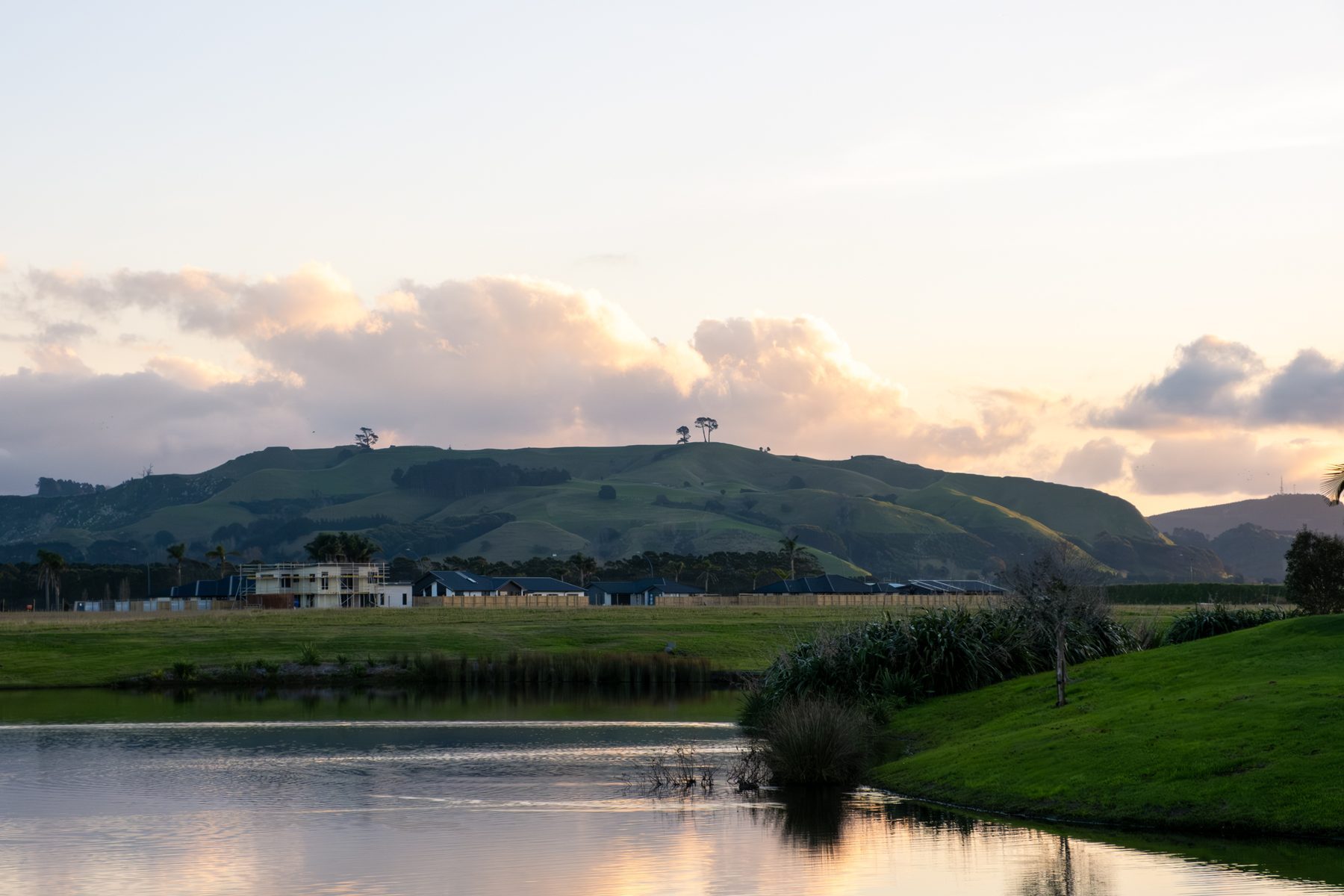 The site beside the water at dusk.