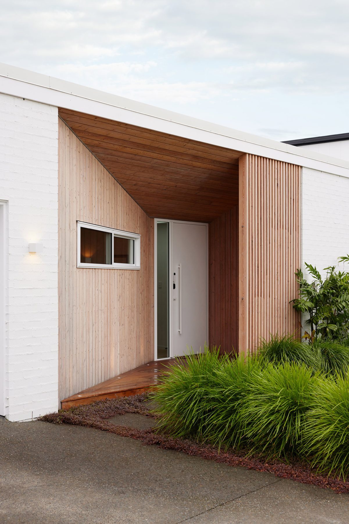 The angled entrance and landscaping.